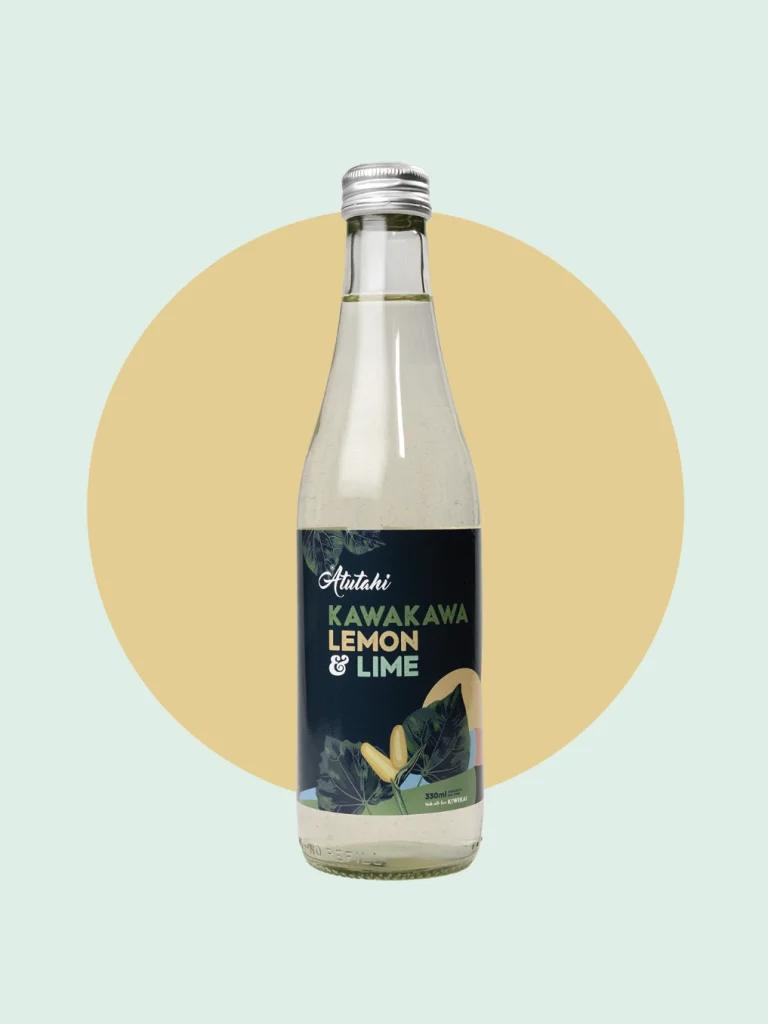 A bottle of Kawakawa Lemon and Lime by Atutahi is set against a bright green backdrop, showcasing its refreshing and tropical vibe.