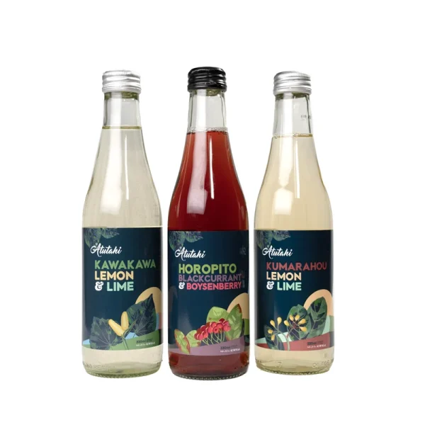 Three colorful juice bottles showcasing different flavors: Blackcurrant, Boysenberry, Horopito, Kawakawa, Kumarahou.