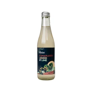 A bottle of Kumarahou lemon and lime against a white backdrop, highlighting its vibrant yellow liquid and simple design.